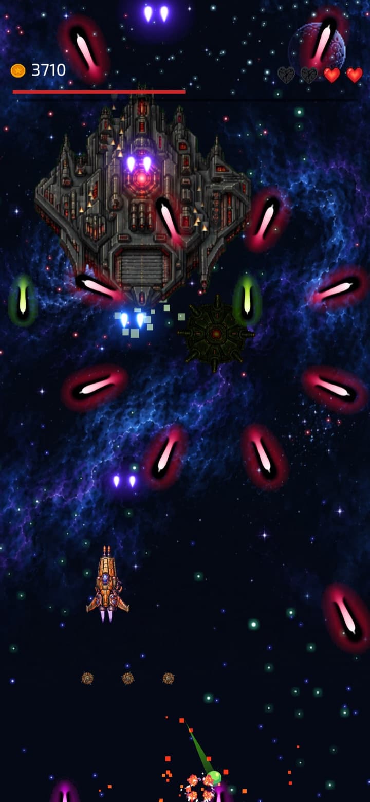 A ring of red enemy shots around the boss